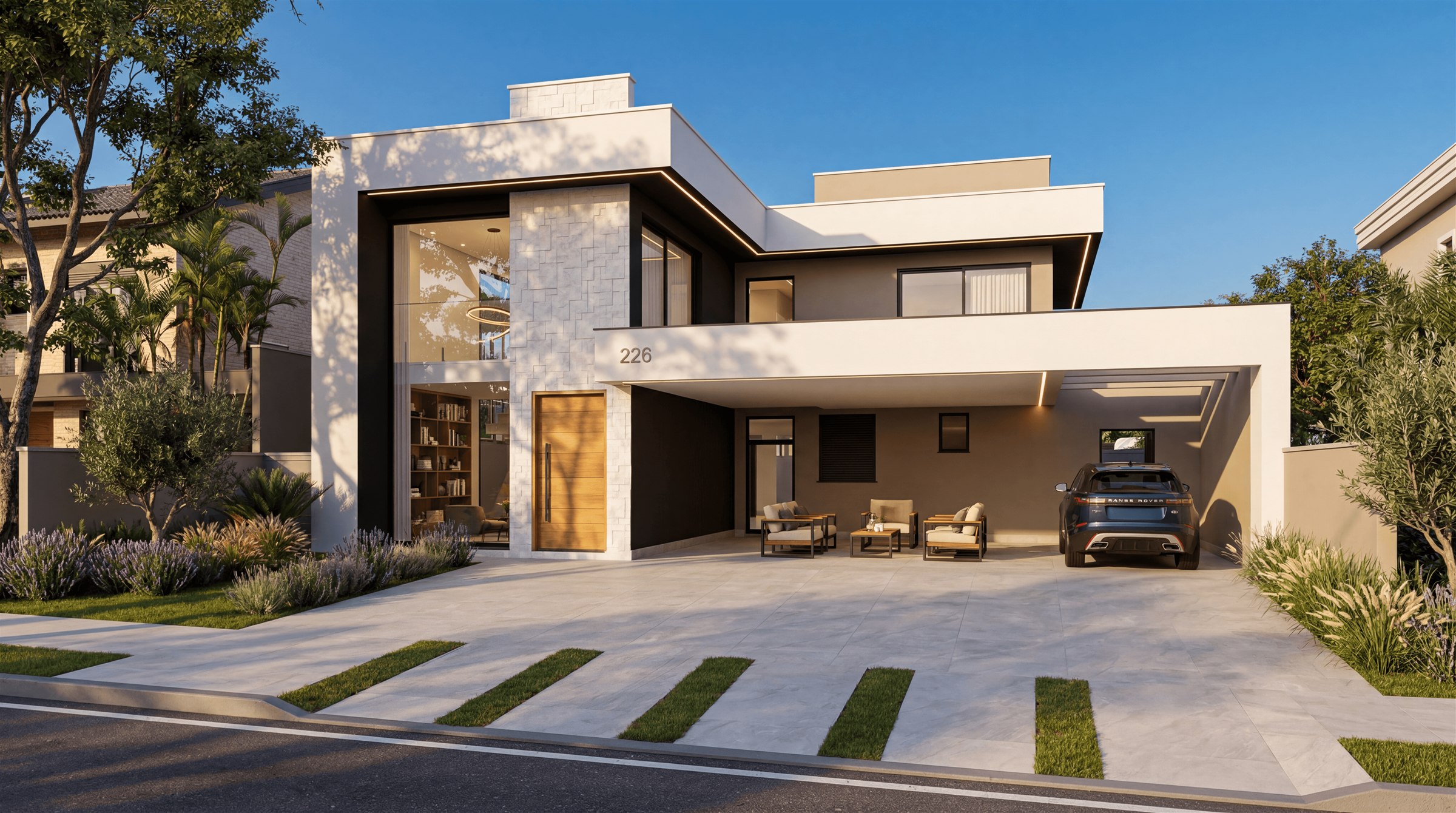 Contemporary home with stone detailing, tall windows and warm architectural lighting
